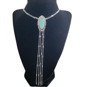 Synthetic turquoise bolo tie style lariat silver tone necklace